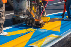 road-workers-group-with-thermoplastic-marking-mach-2026-01-09-00-31-53-utc